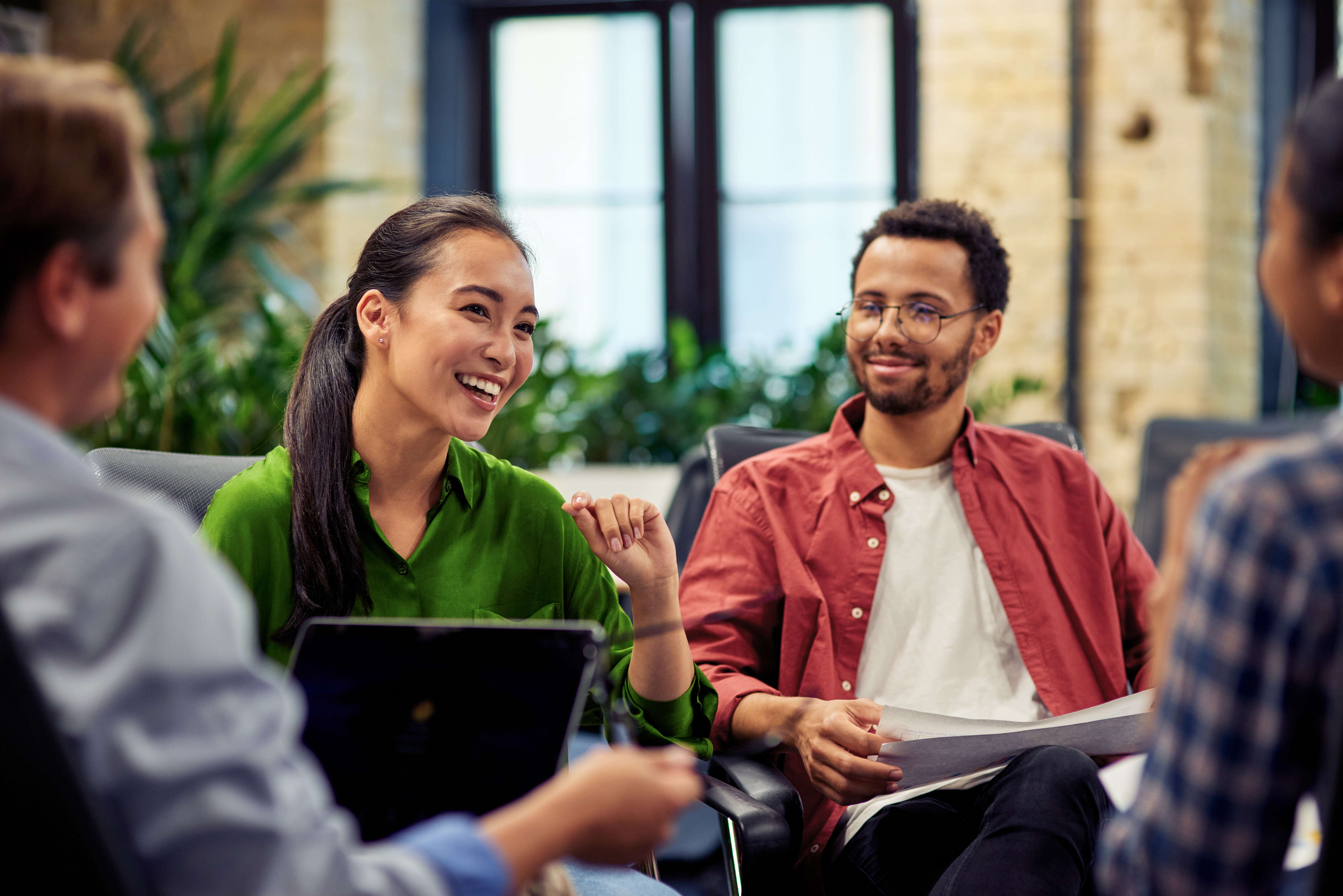 Close up shot of two people in discussion circle