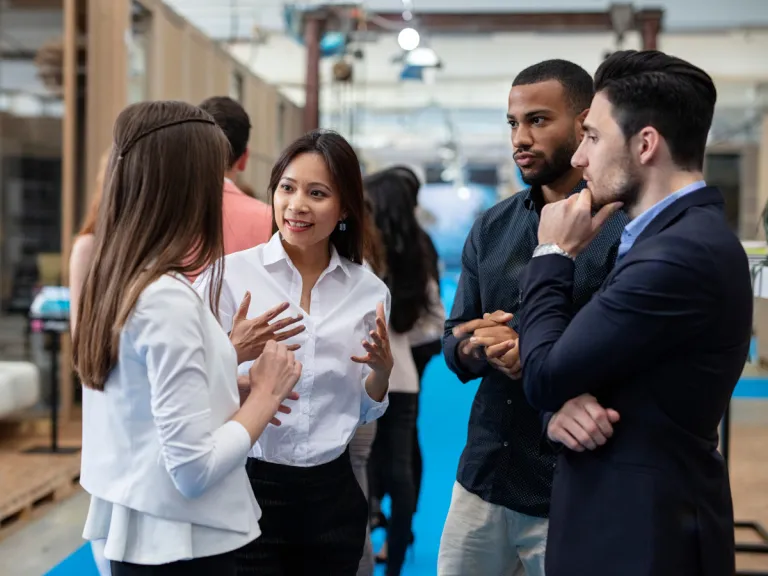 Group of young professionals talking